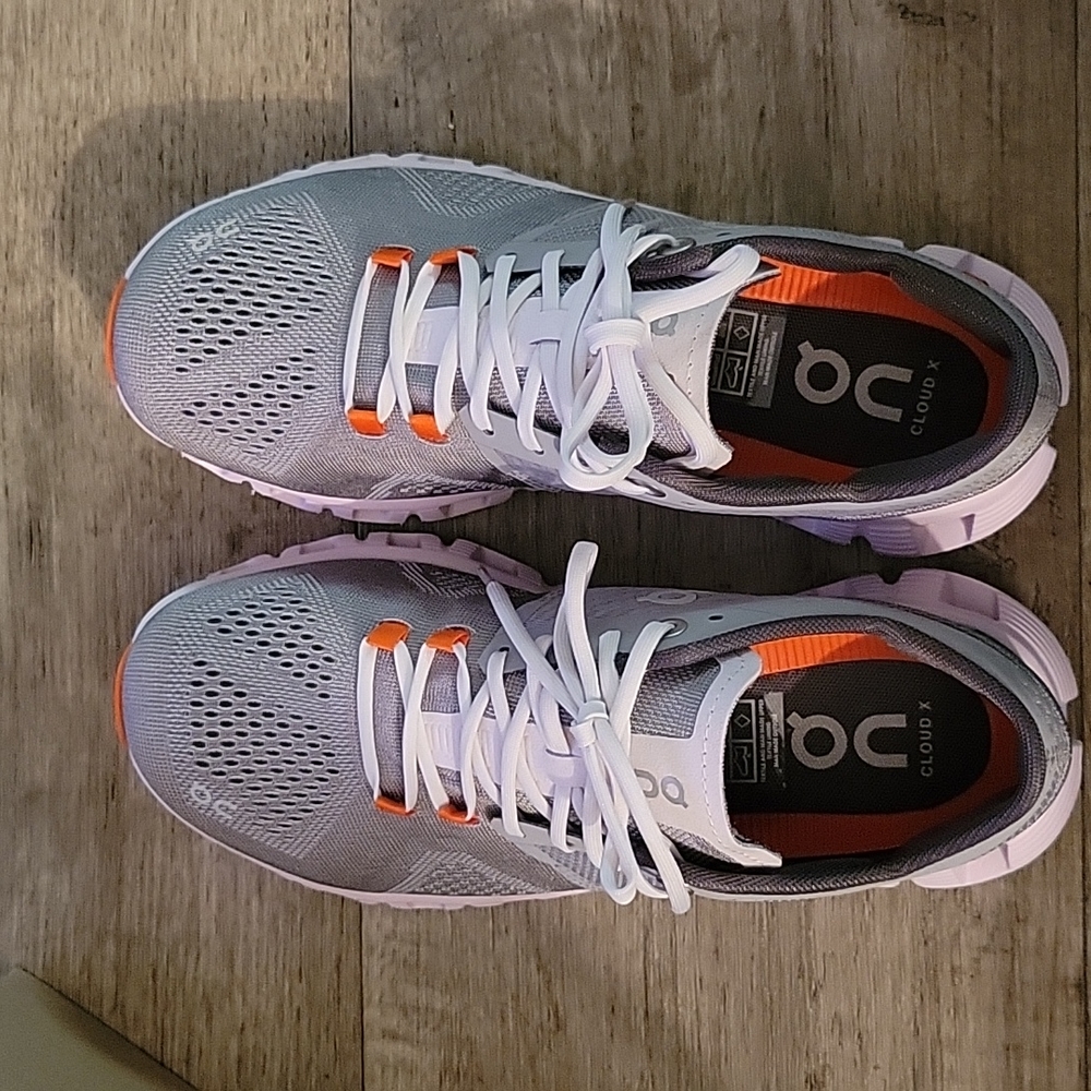 Qc Sneakers new in the box.